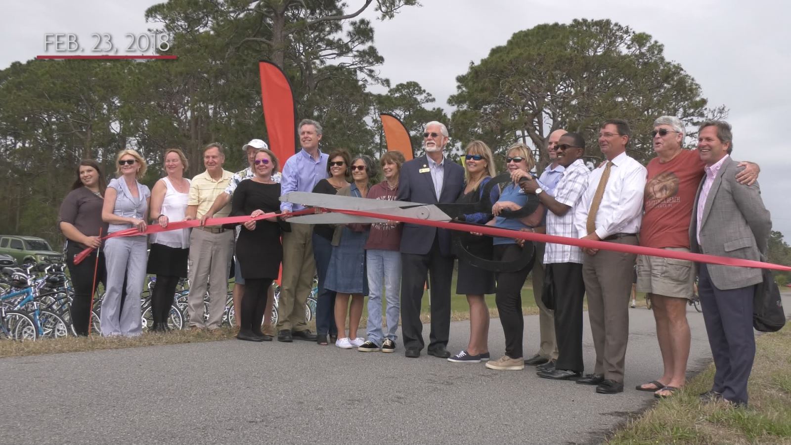 The ribbon cutting at the opening of a large section of trail in Titusville, FL.